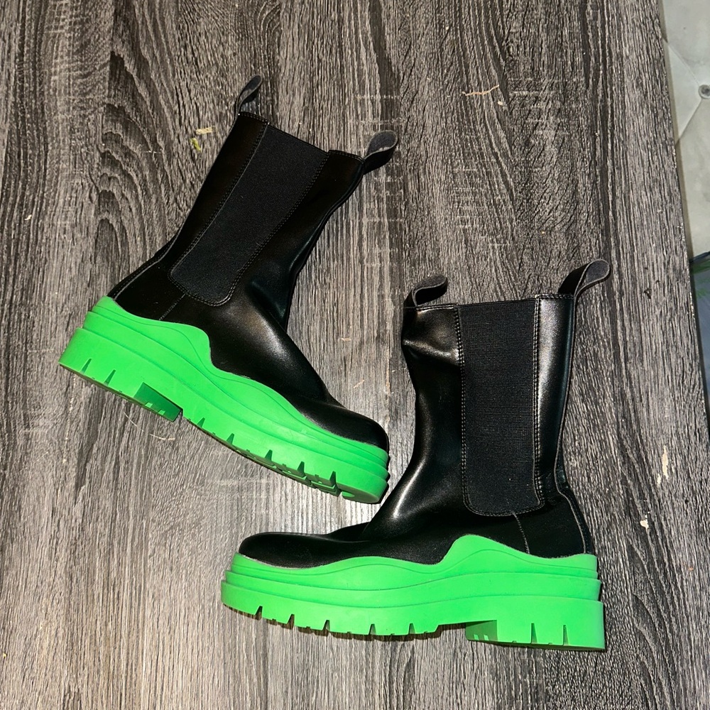 green and black leather boots